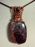 Mexican Crazy Lace Agate & Garnet copper wire-wrapped pendant