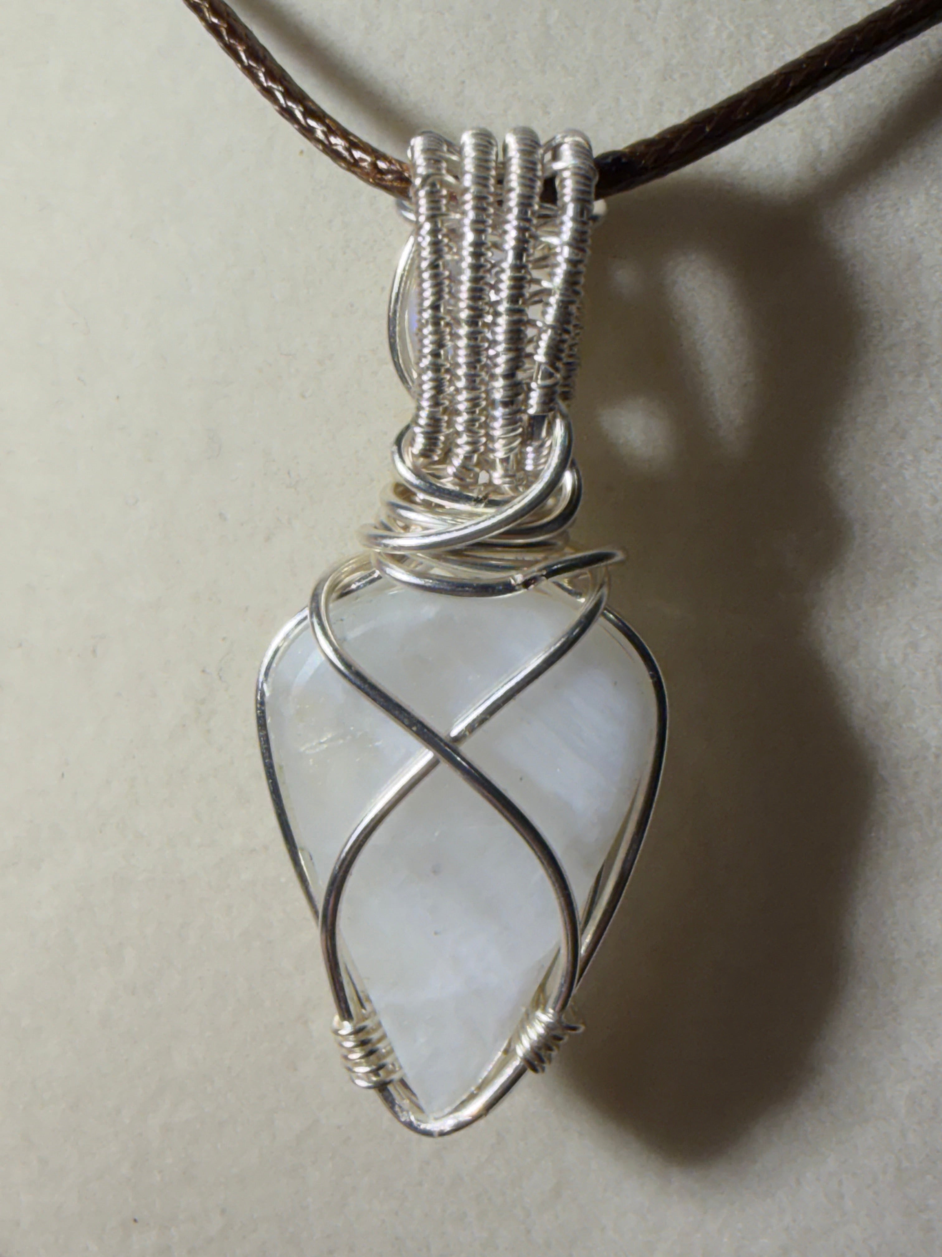 Double Moonstone silver-tone copper wire-wrapped pendant