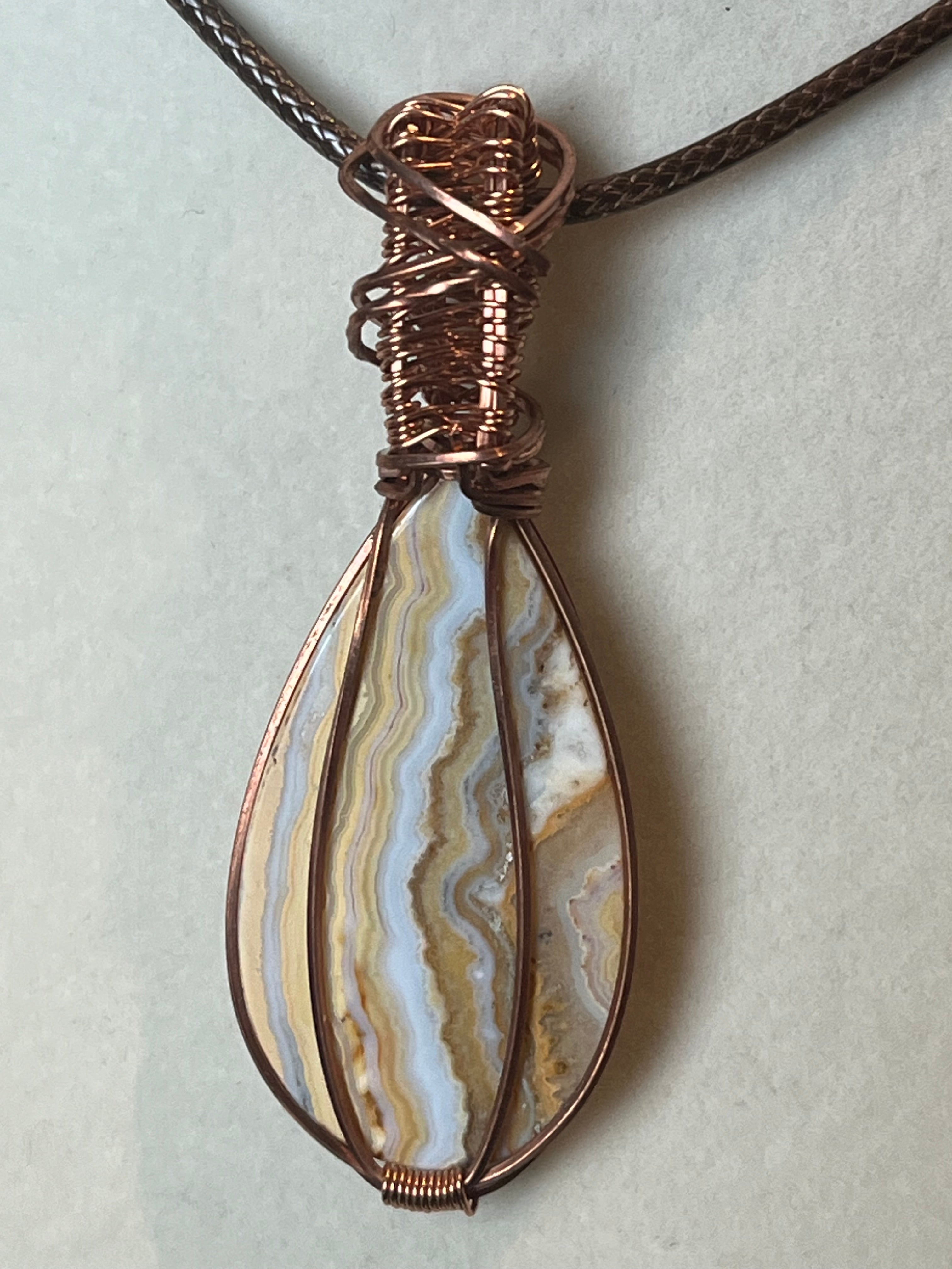Crazy Lace Agate copper wire-wrapped pendant