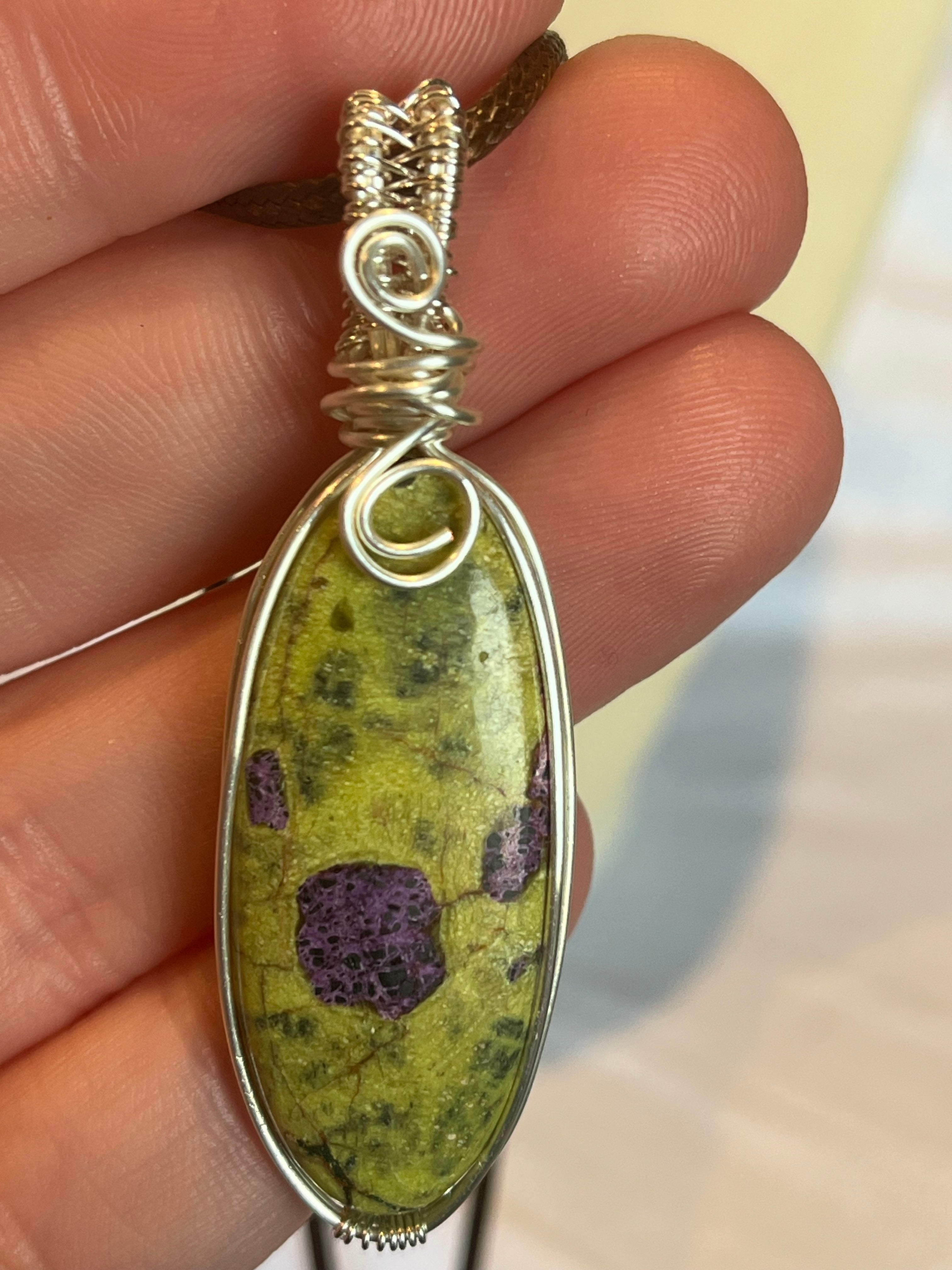 Atlantisite silver-tone copper wire-wrapped pendant