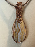 Crazy Lace Agate copper wire-wrapped pendant