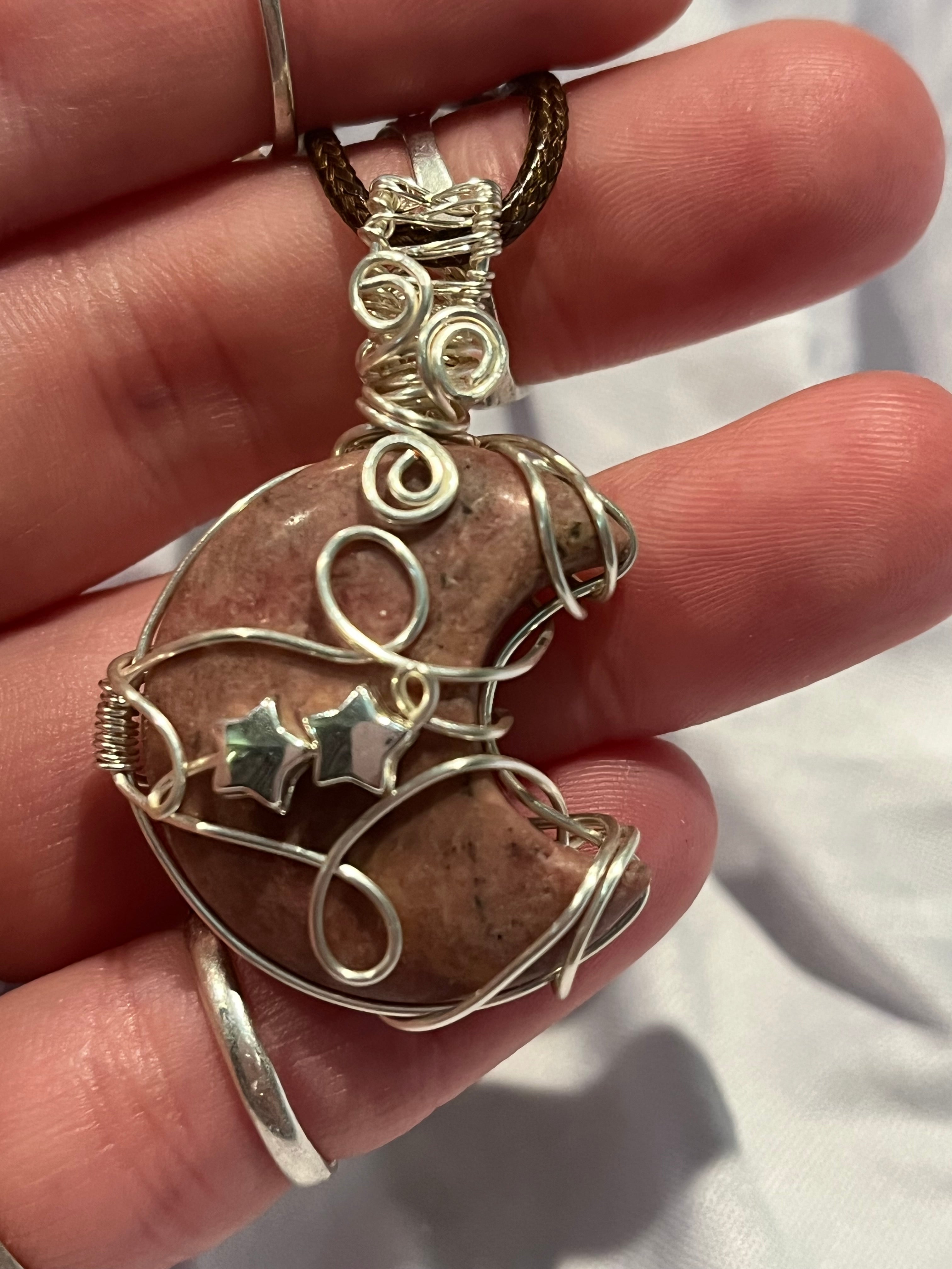 Rhodonite moon silver-tone copper wire-wrapped pendant