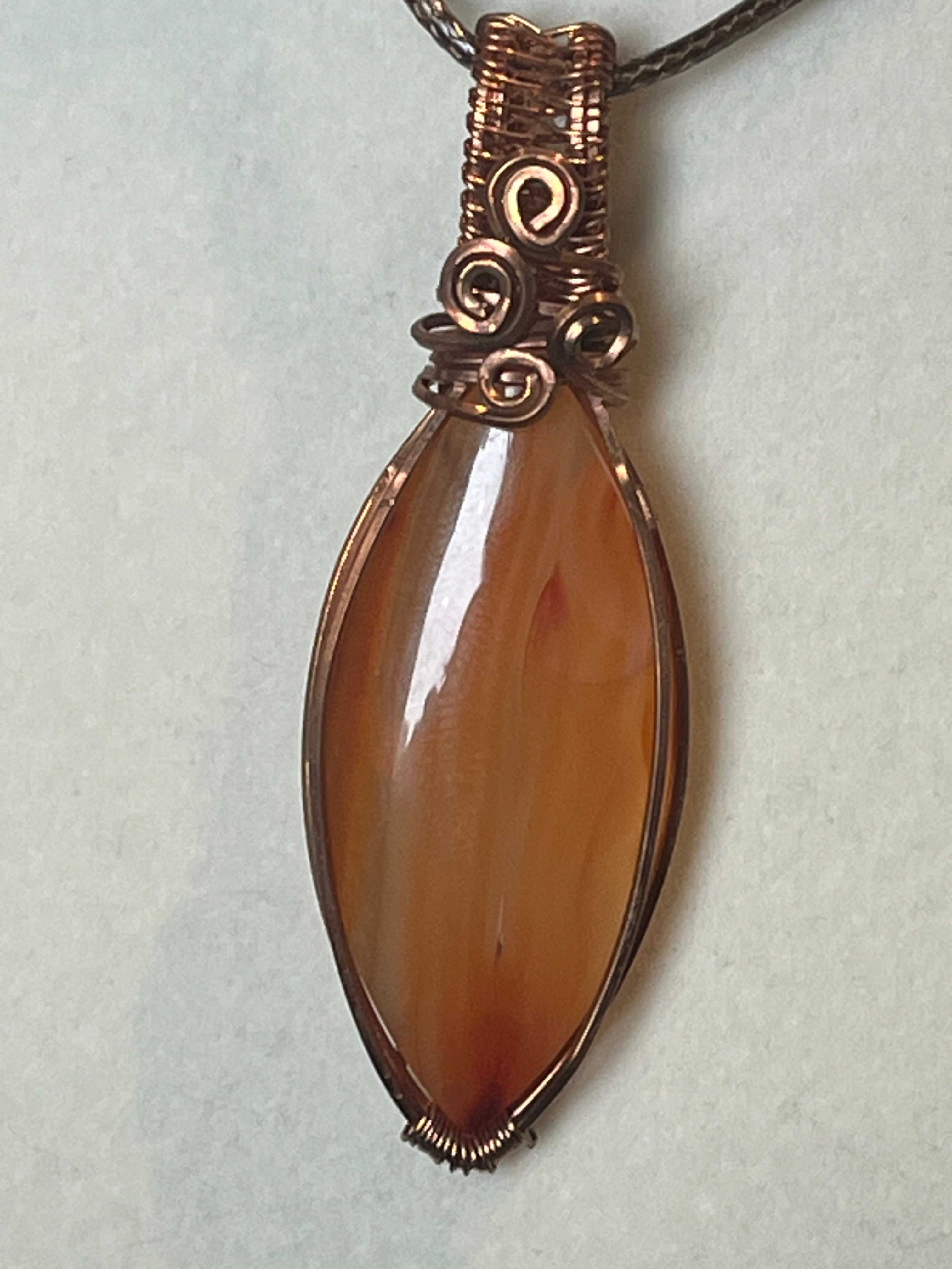 Carnelian copper wire-wrapped pendant