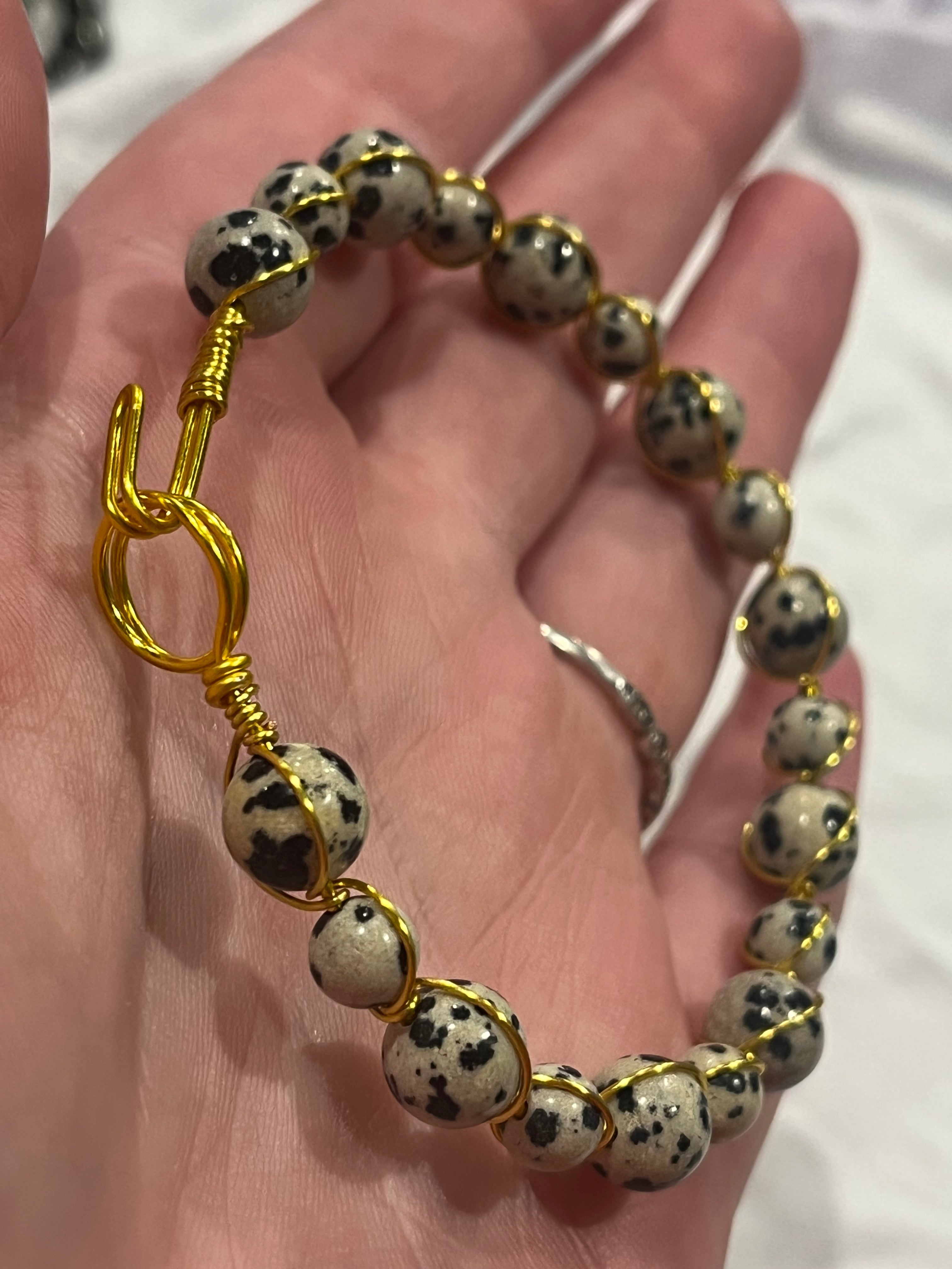 Dalmatian Jasper 7.5 inch gold-tone copper wire wrapped bracelet