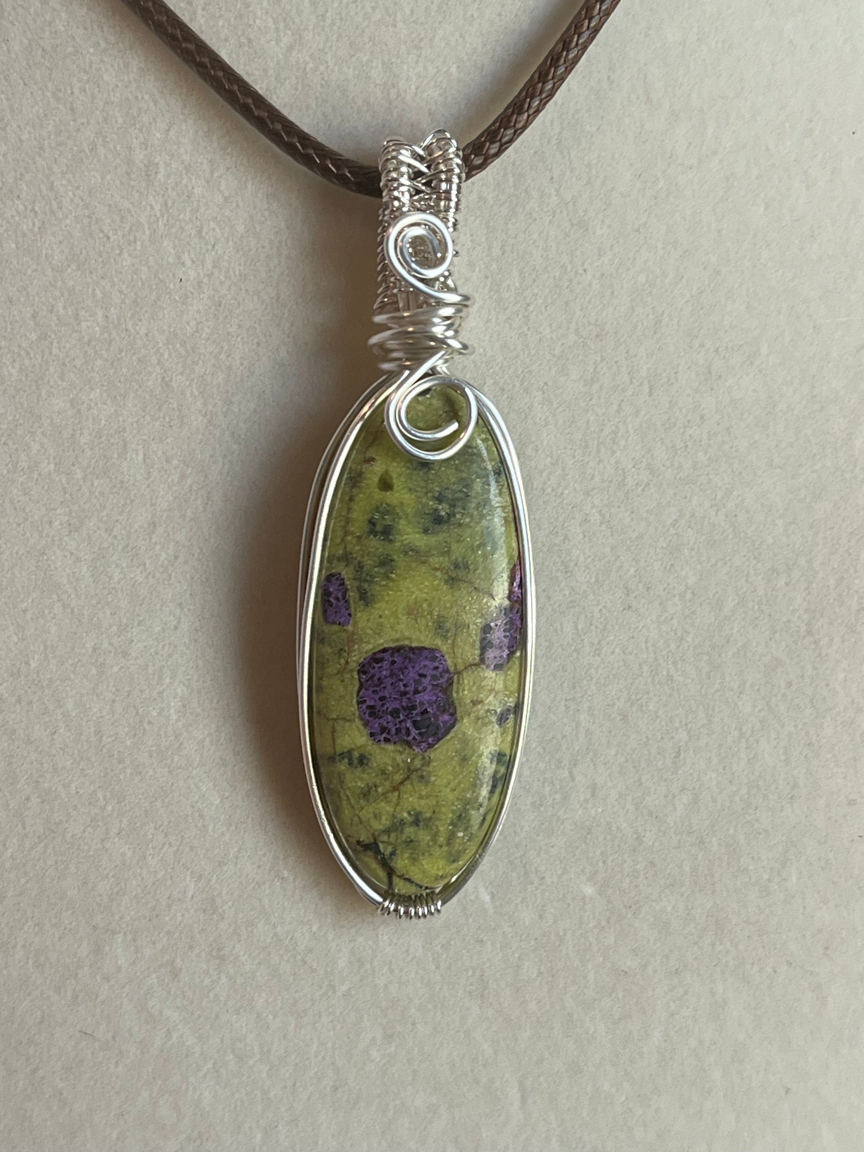 Atlantisite silver-tone copper wire-wrapped pendant