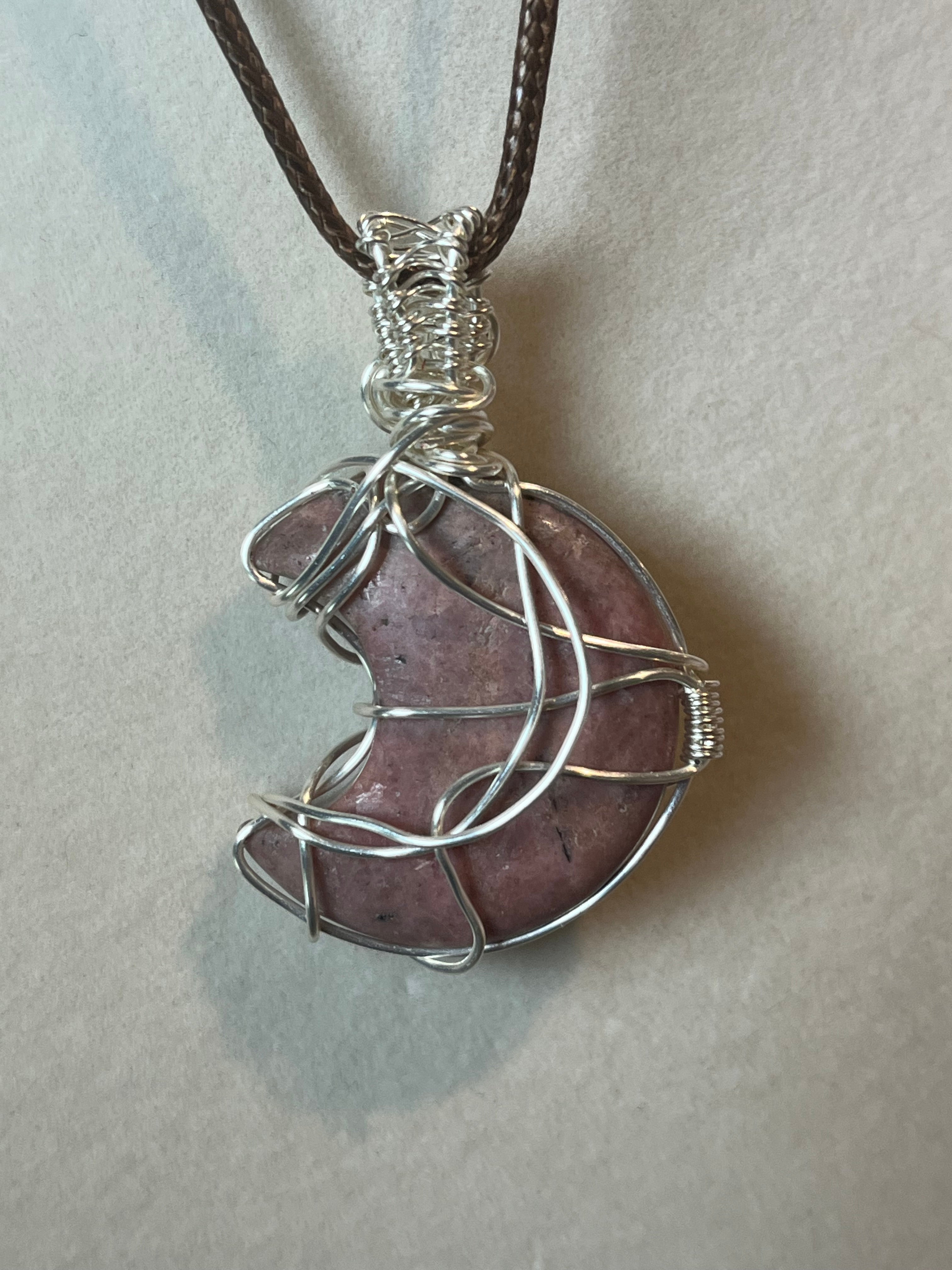 Rhodonite moon silver-tone copper wire-wrapped pendant