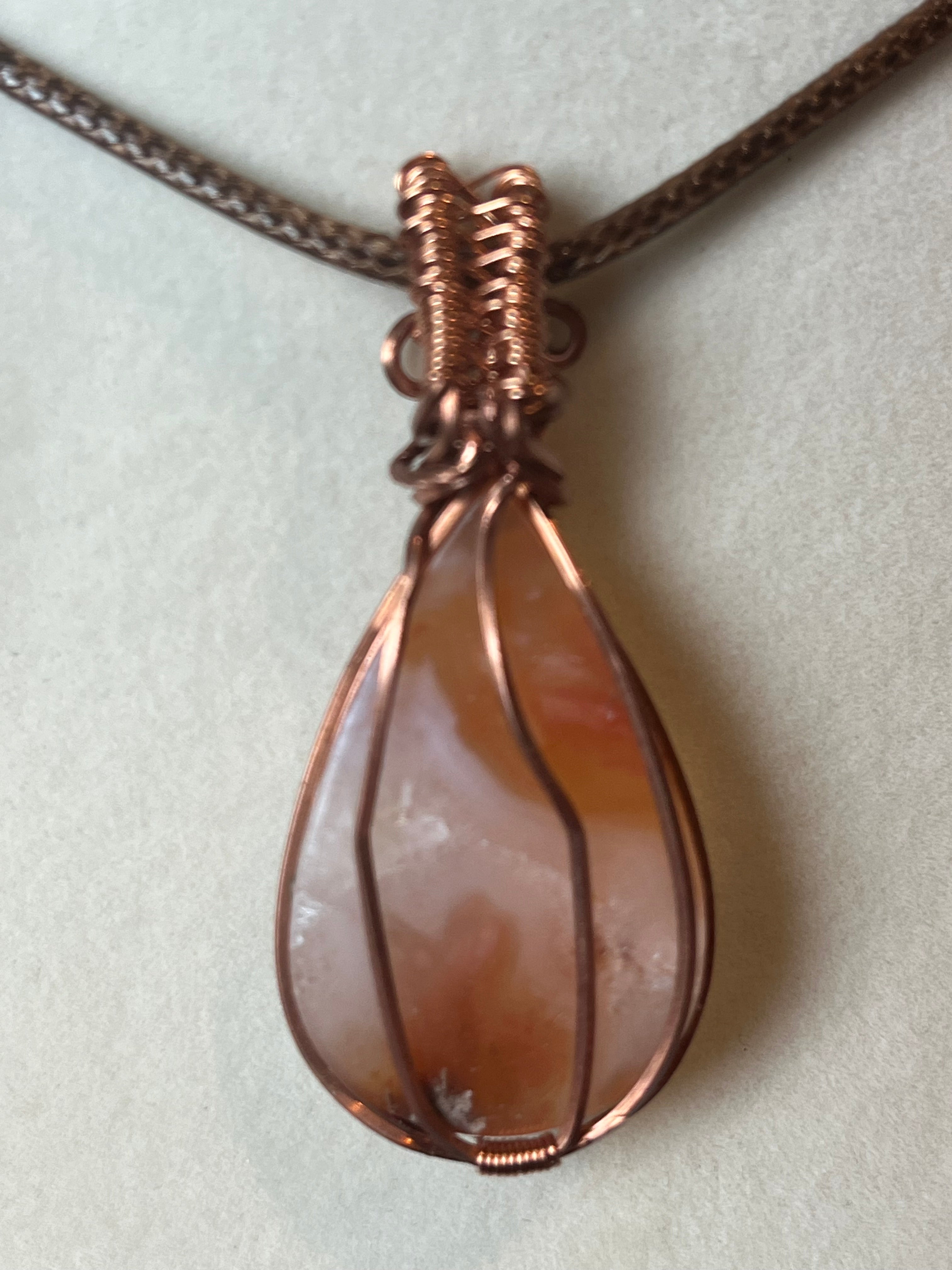 Carnelian copper wire-wrapped pendant