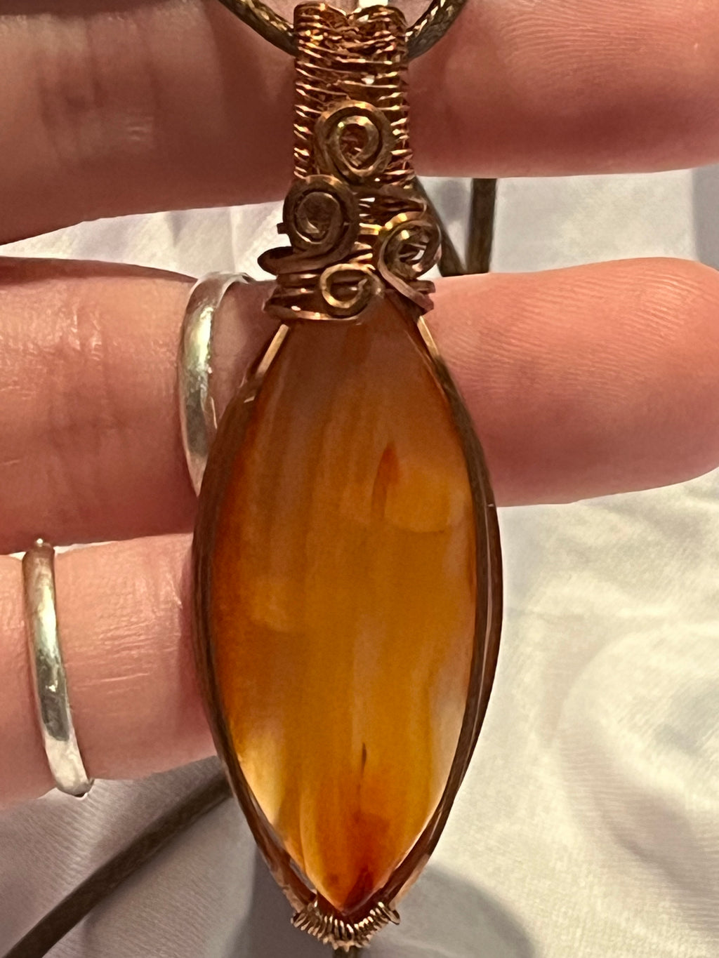 Carnelian copper wire-wrapped pendant