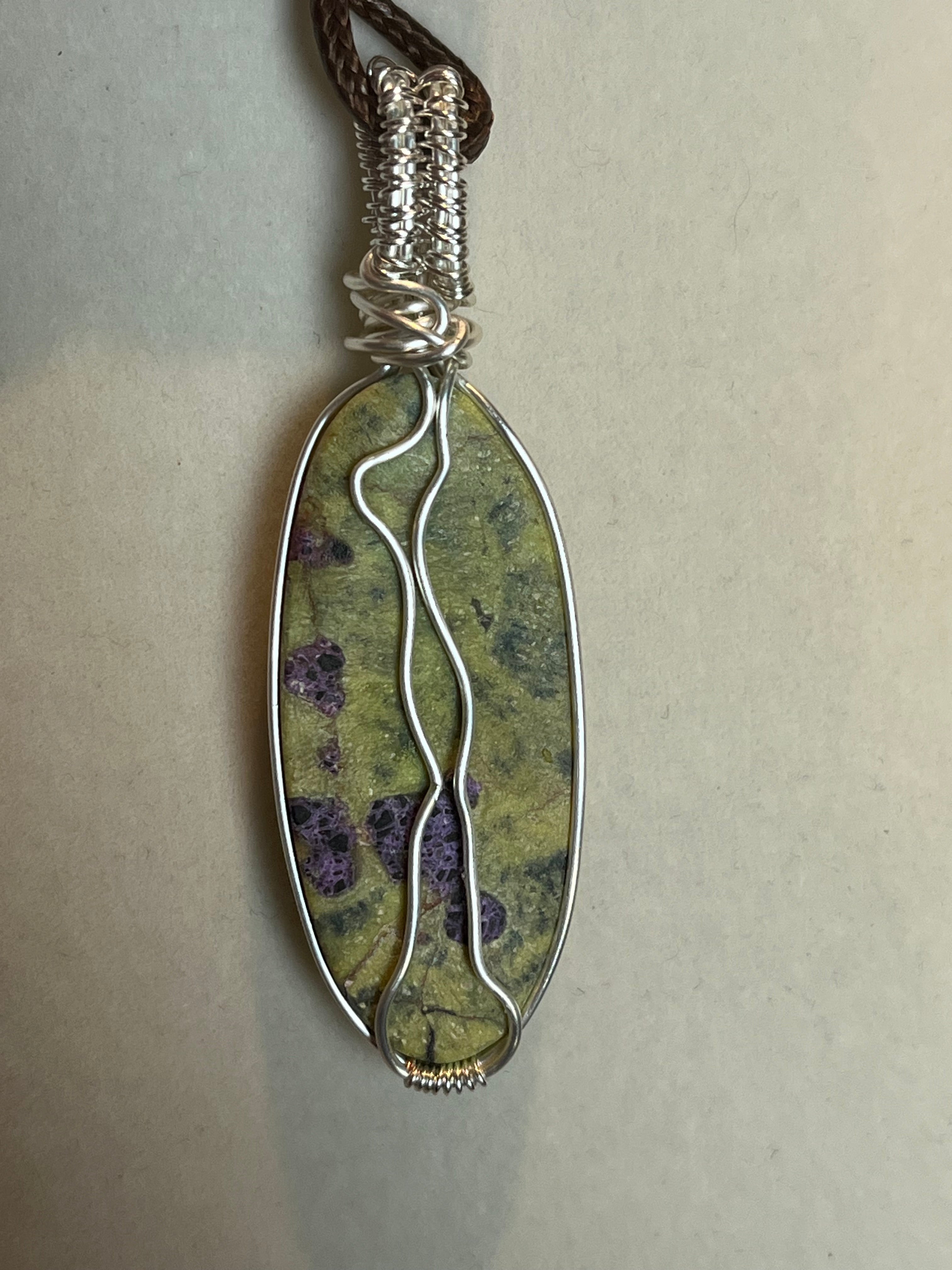 Atlantisite silver-tone copper wire-wrapped pendant