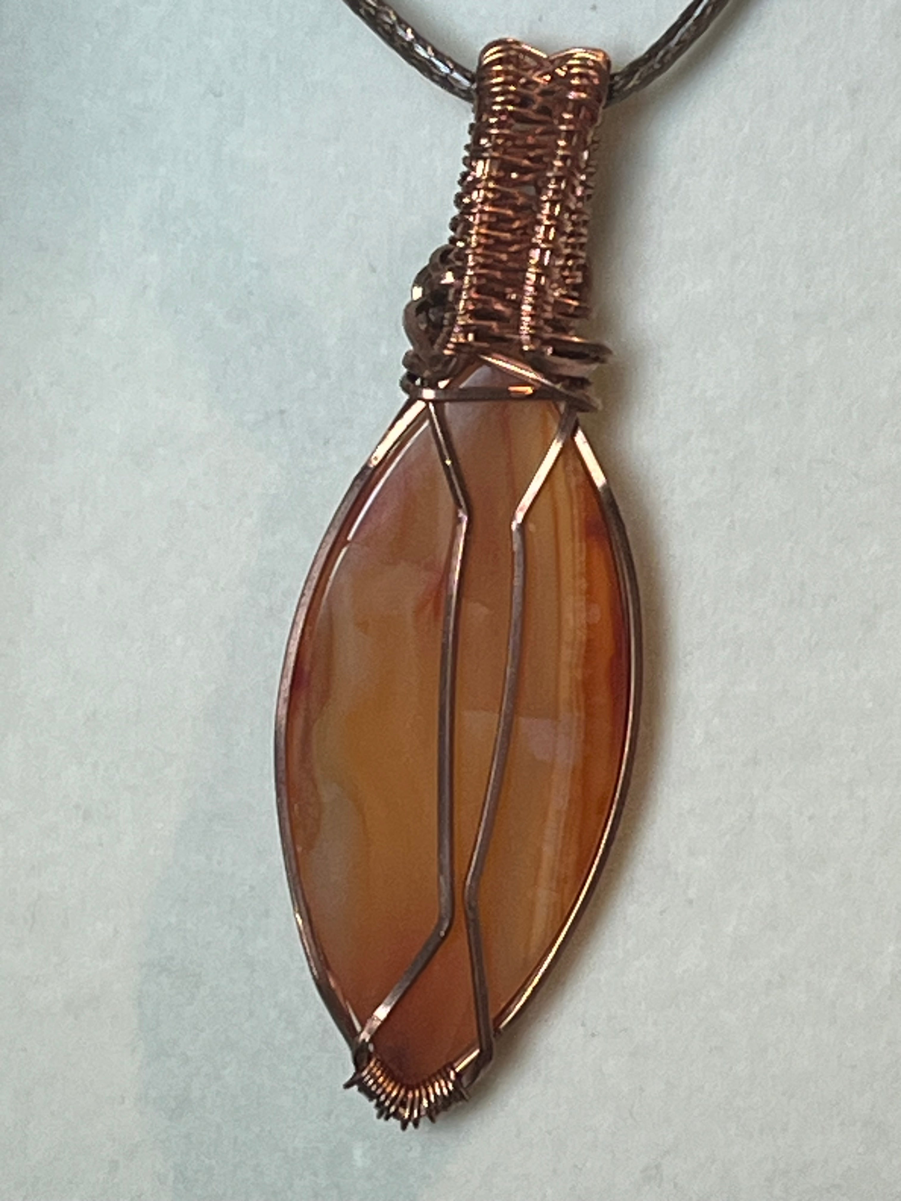 Carnelian copper wire-wrapped pendant