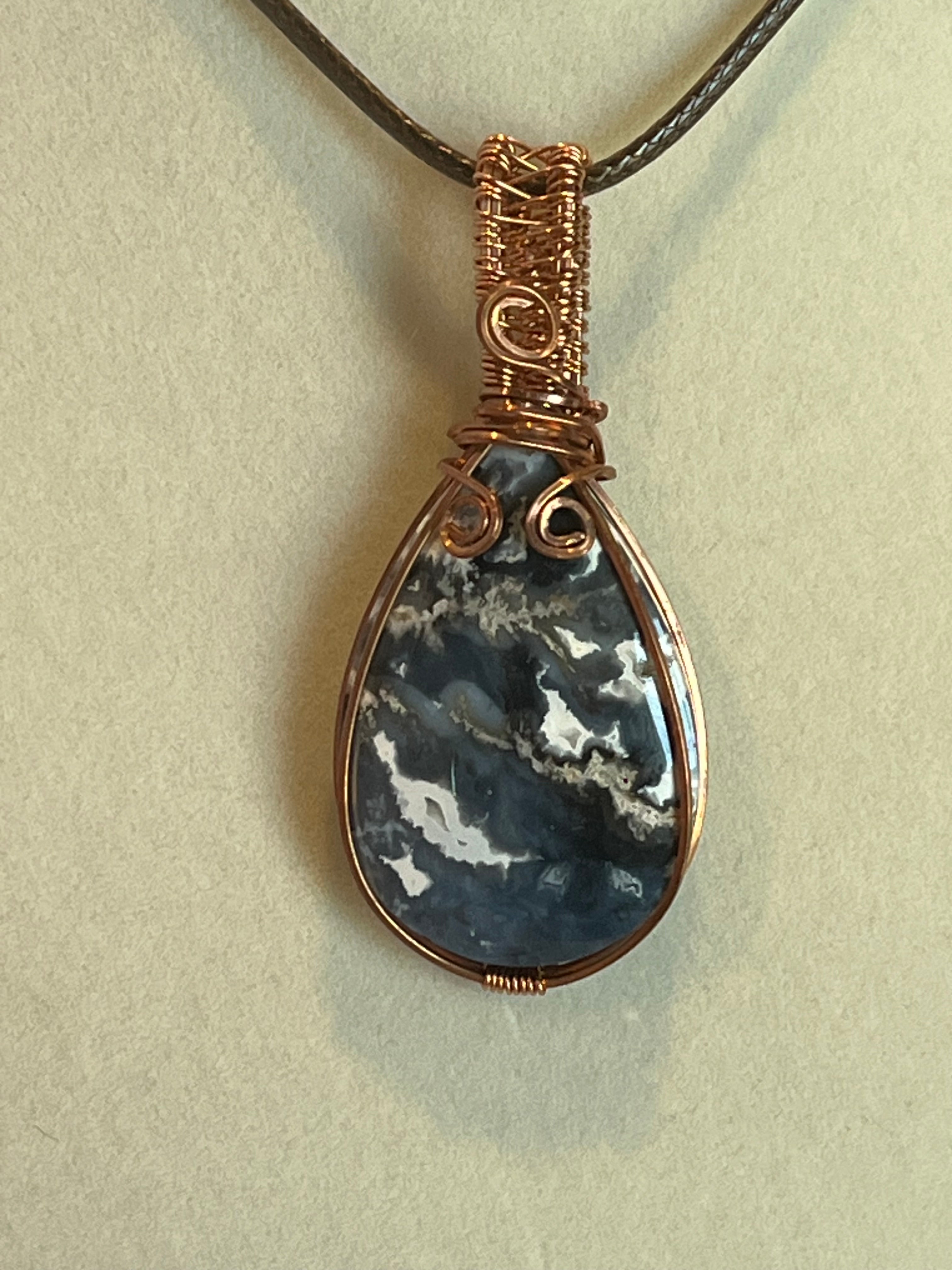 Plume agate teardrop copper wire-wrapped pendant