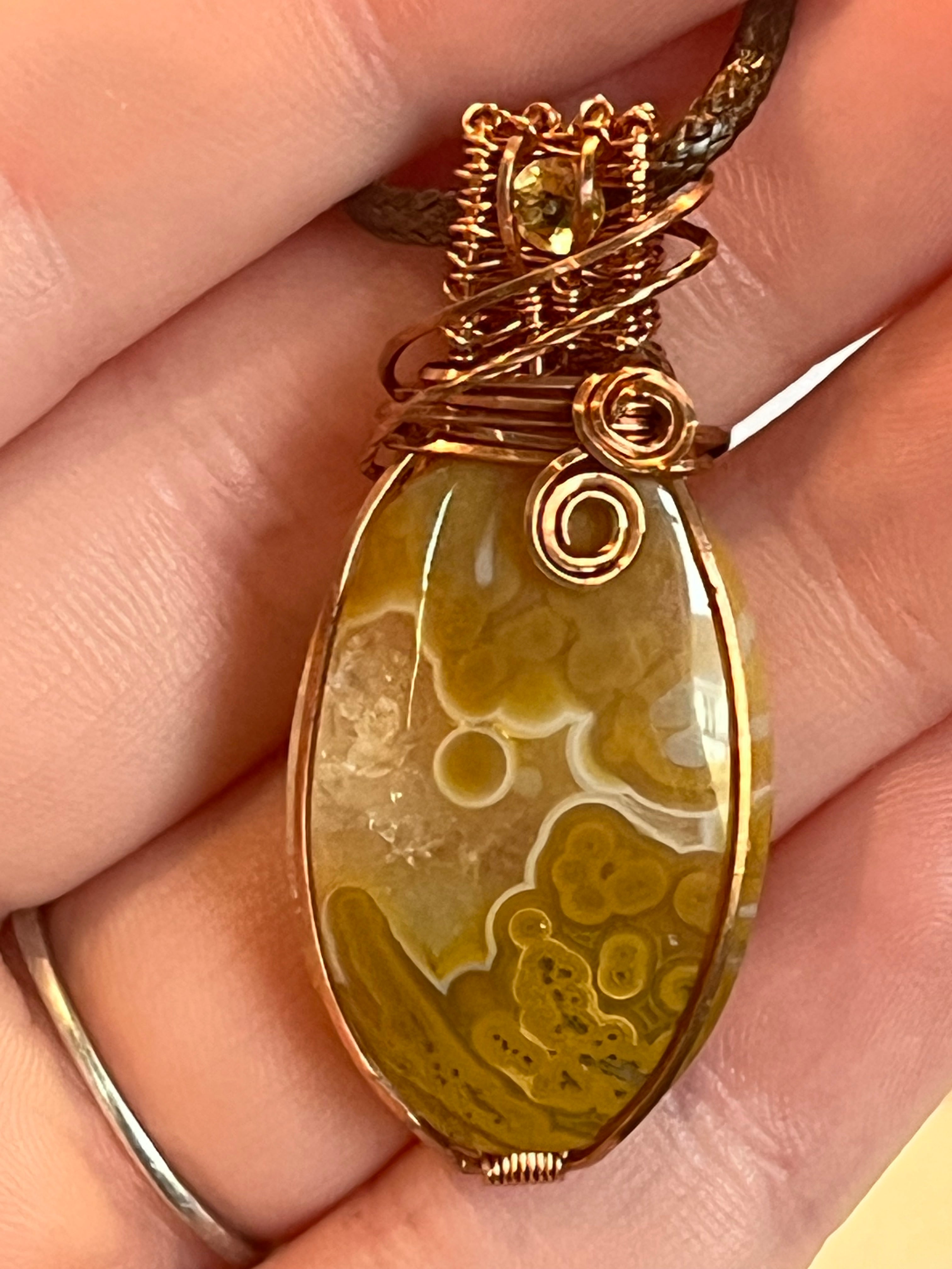 Crazy Lace Agate & Orbicular Jasper copper wire-wrapped pendant with Citrine facet