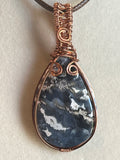 Plume agate teardrop copper wire-wrapped pendant