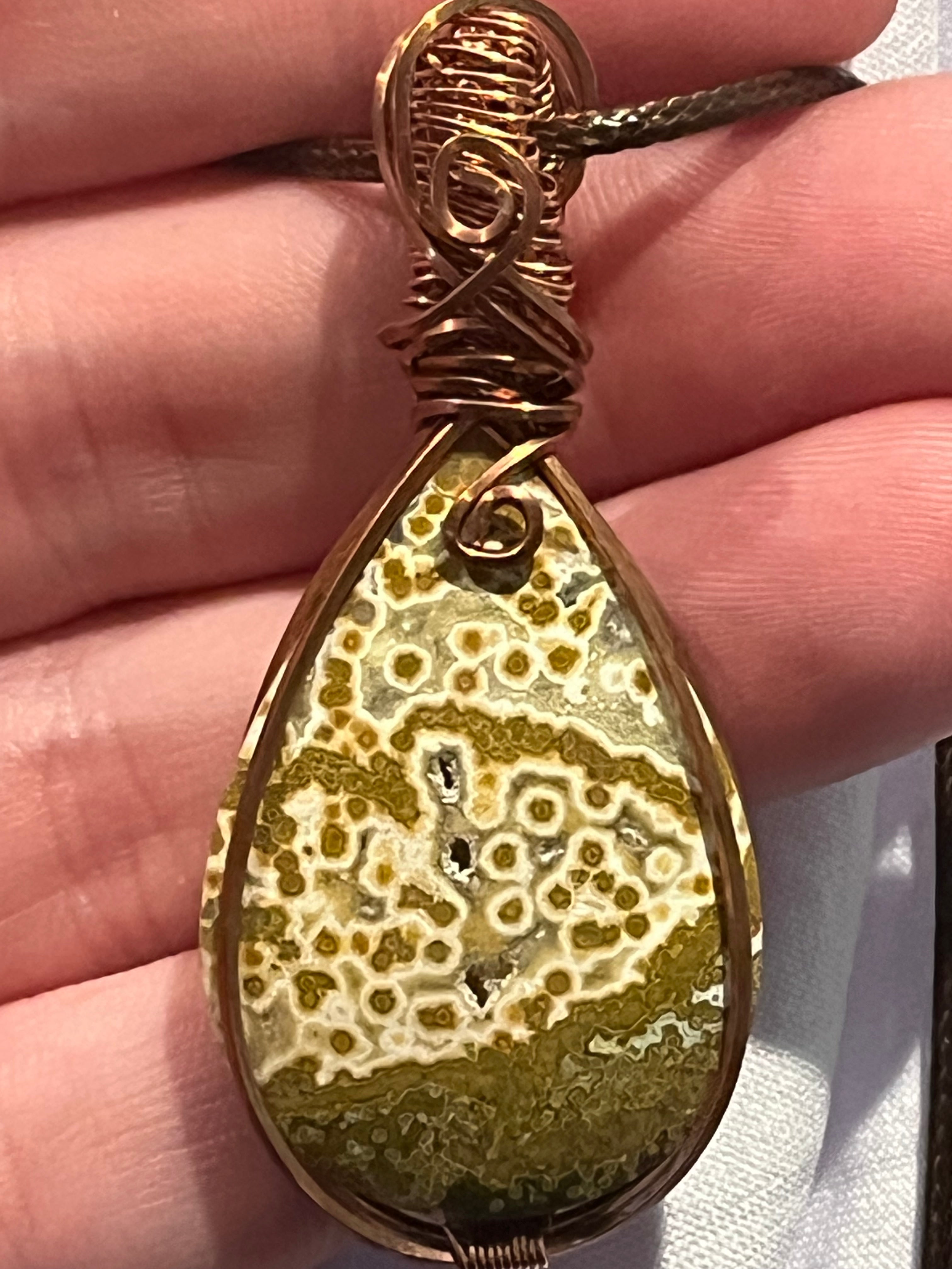 Orbicular Jasper copper wire-wrapped pendant
